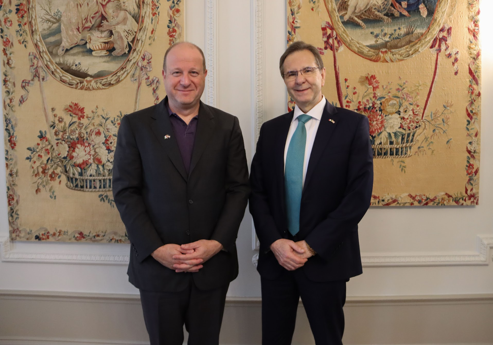 Governor Polis and Esteban Moctezuma Barragán posing for a photo.